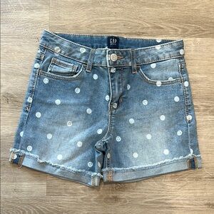 GAP Blue Jeans with Playful Distressed Design